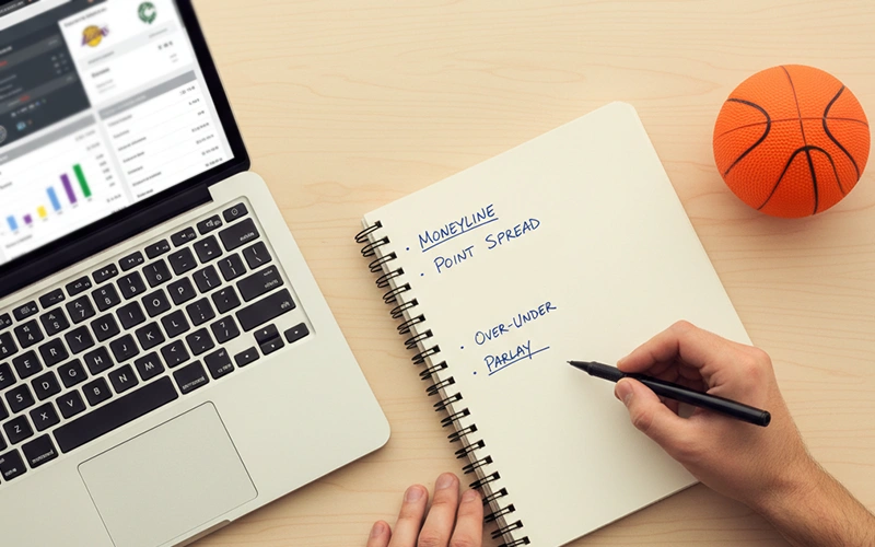 Sportwedder maakt notities bij wedstrijdanalyse